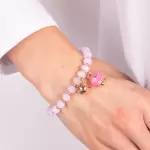 Bracciale in Metallo campanella fucsia e piccolo sonaglio con pietre rosa