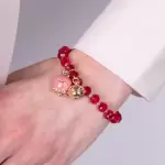 Bracciale in Metallo campanella bianca e piccolo sonaglio con pietre rosa